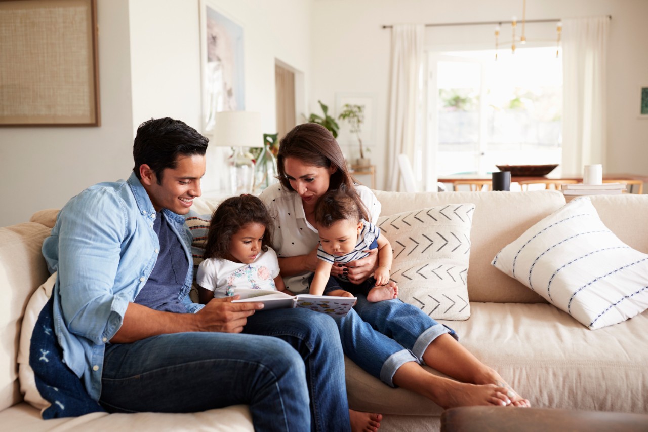 family reading a book