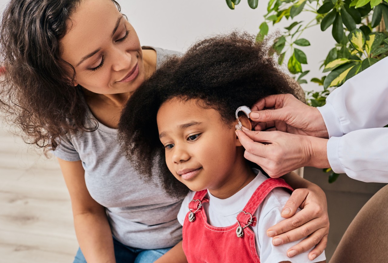 Young girl at hearing aid fitting