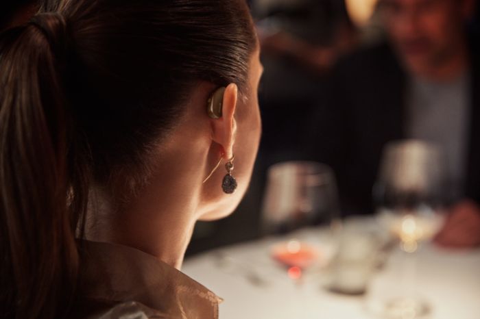 Girl wearing a hearing aid 