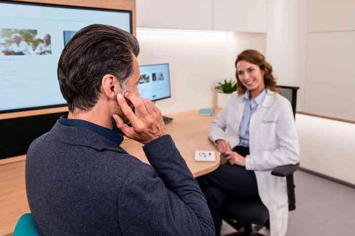 client trial mini female audiologist