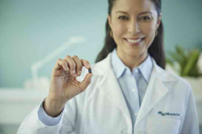 Hearing care specialist and patient