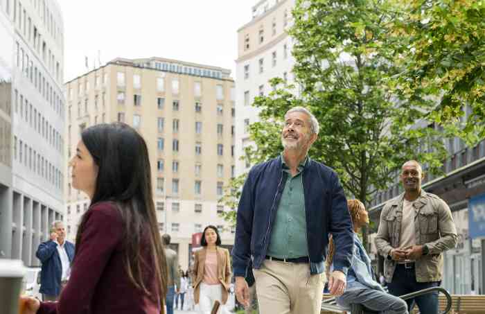 Man walking outside hearing all sounds clearly