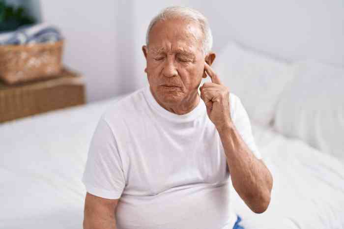 Man experiencing ear pain