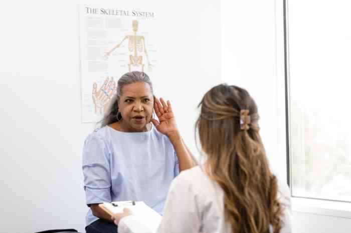 Woman during  hearing check