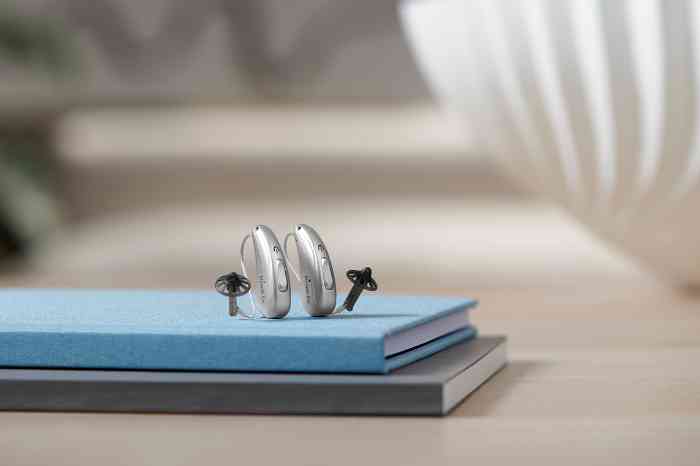BTE hearing aids on a book
