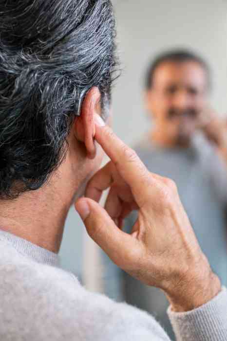 male client with hearing aid