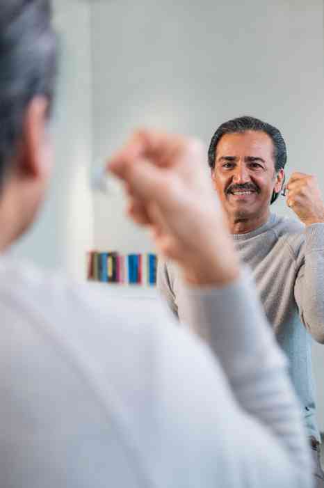 male client with hearing aid