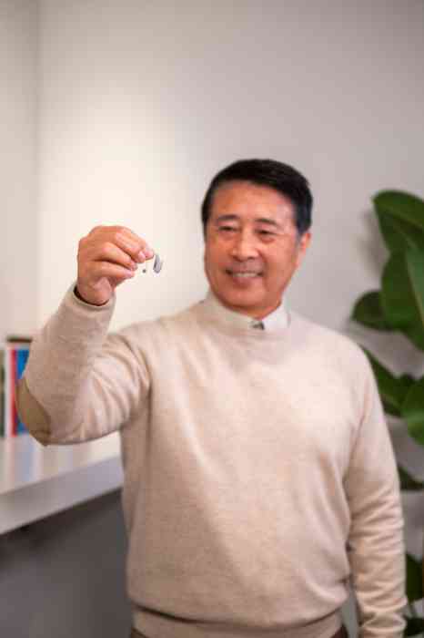 male client with hearing aid