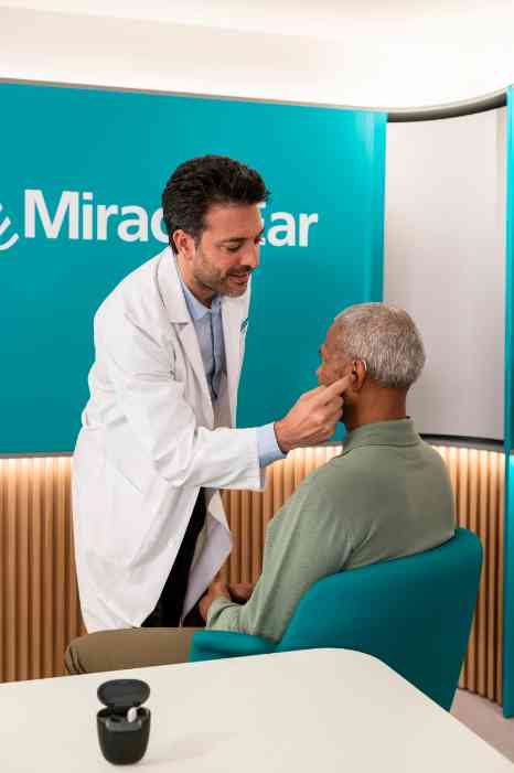 hearing care professional at store