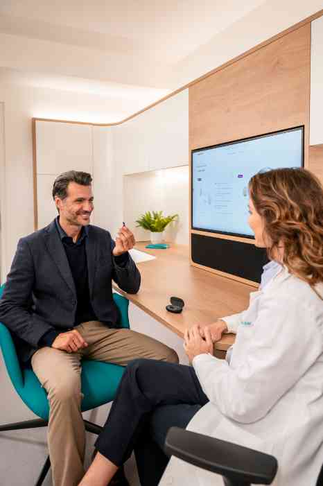 hearing care professional at store