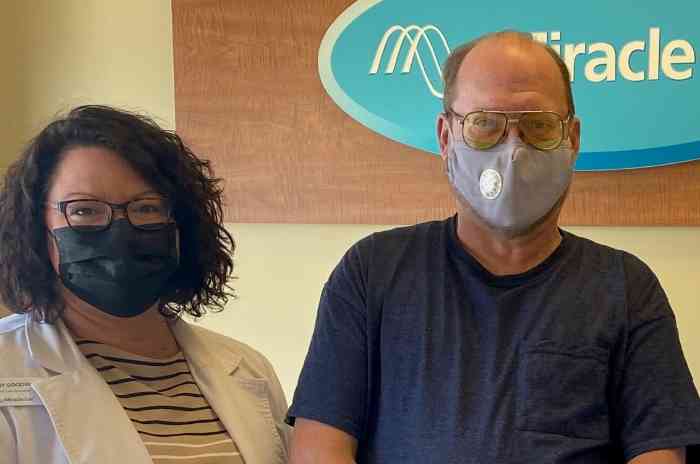 Gift of Sound recipient Paul and Tiffany, his HCP