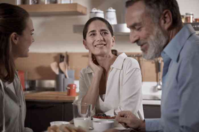 Smiling woman at dinner