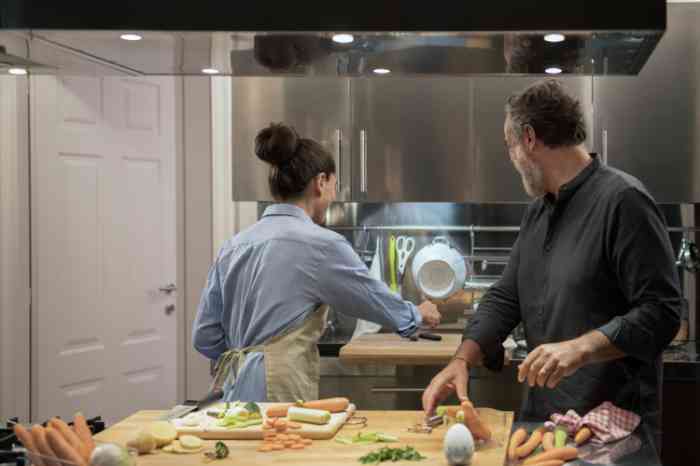 Couple cooking dinner in the kitchen