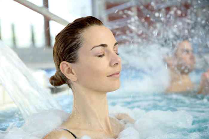 A girl relaxing in the swimming pool