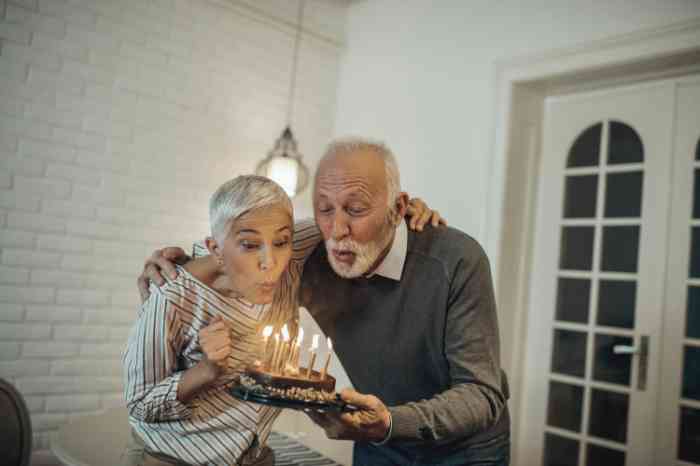 Couple with birthday cake