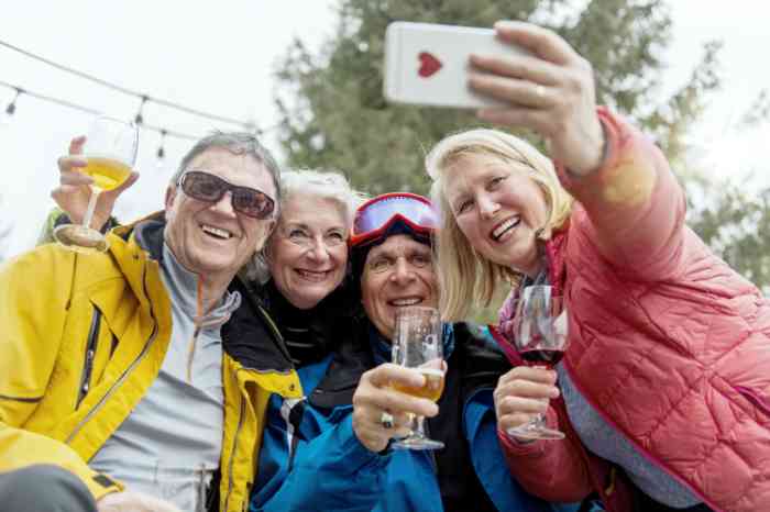 Grandma reading a book to her grandkids