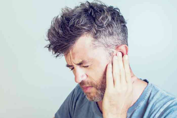 Man with ear pain