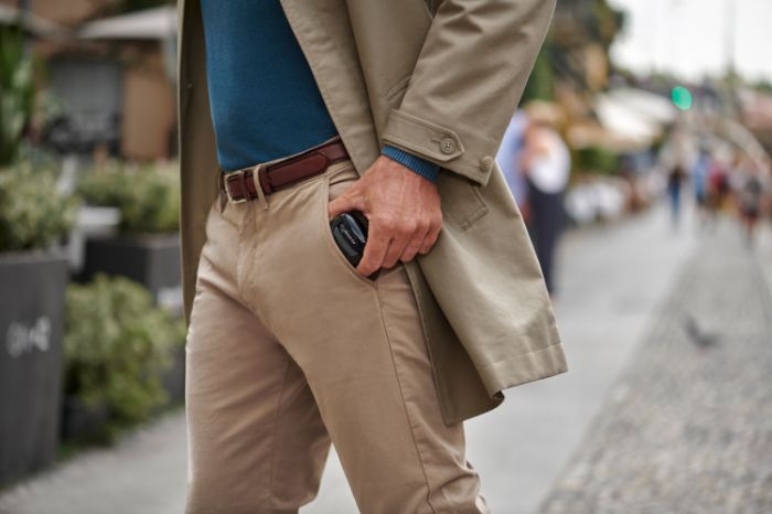 Miracle-Ear charger fits in a man's pocket