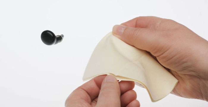 Cleaning hearing aids