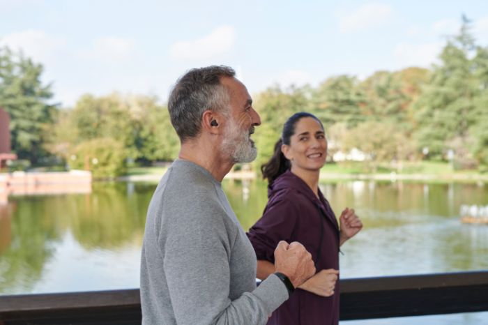 Couple jogging near a river