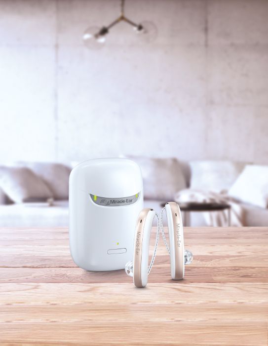 Wooden table top with blur of modern living room interior. 3D Render