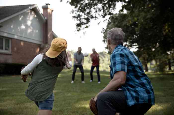 Father and sun playing baseball