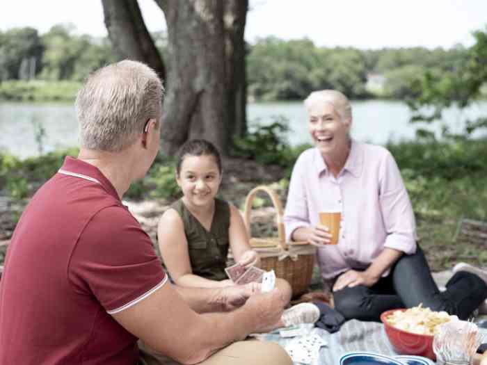 Grandparents at a picnic with their niece