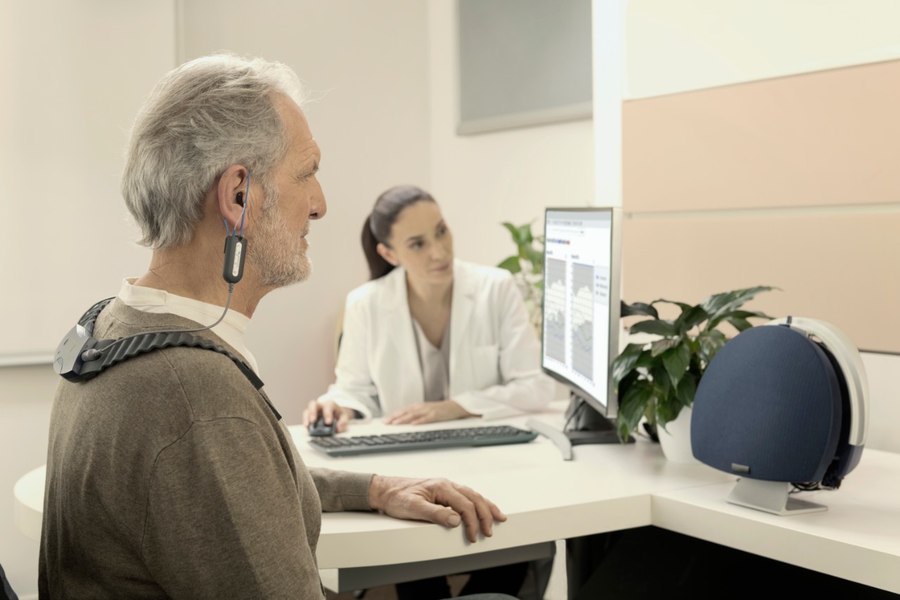 Customer trying hearing aid 