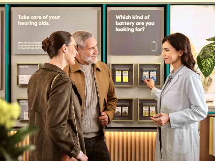 Woman smiling during the hearing test