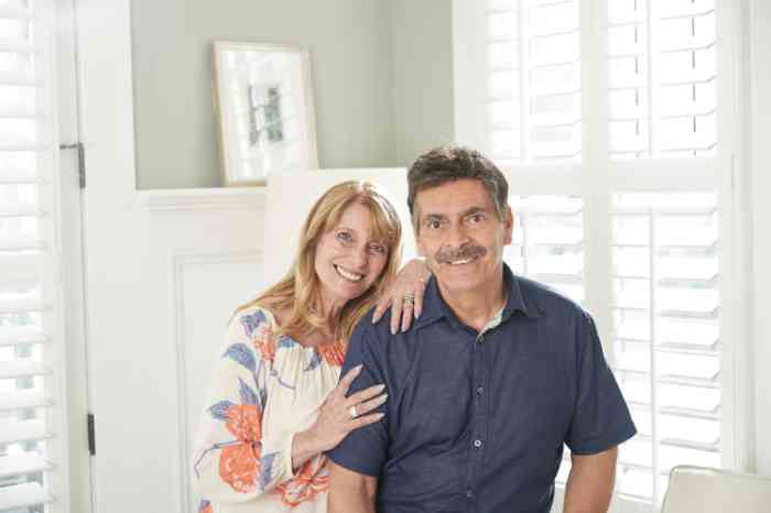 Miracle-Ear customer standing inside with her husband