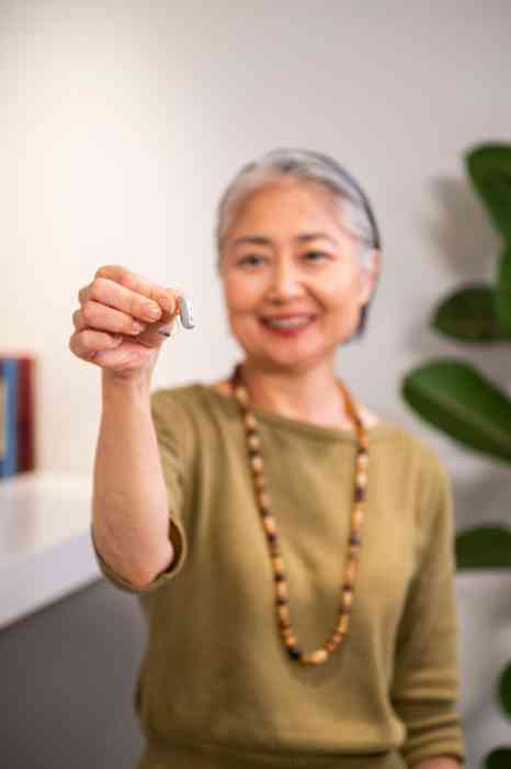 female client with hearing aid
