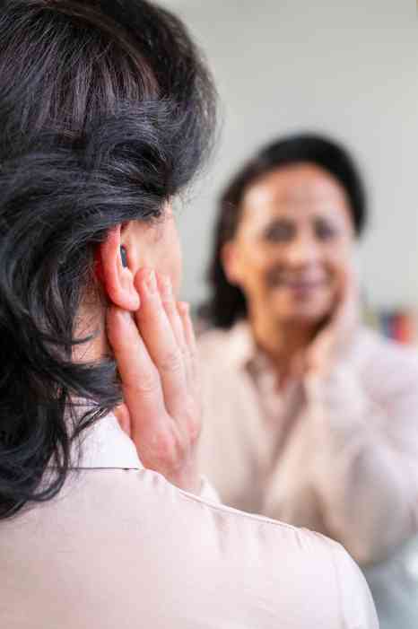 female client with hearing aid
