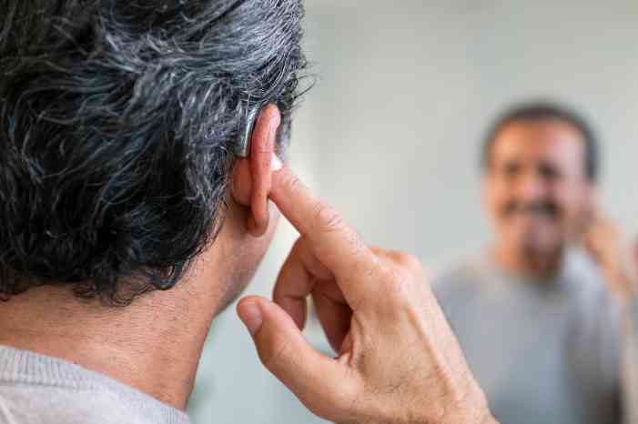 male client with hearing aids