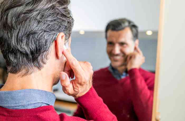 male client with hearing aid