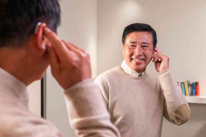 male client with hearing aid