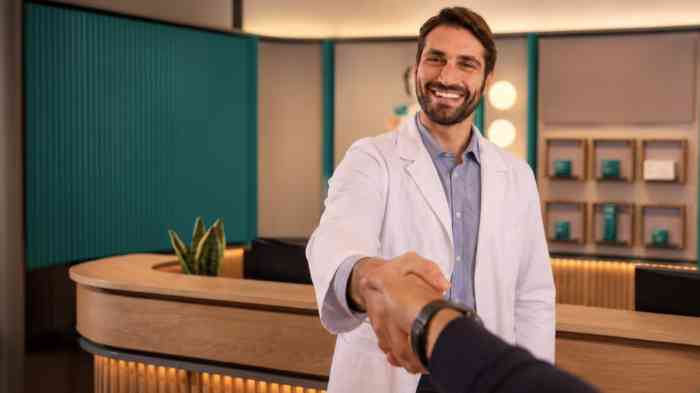 1st person POV of shaking hands with a male Miracle-Ear hearing care professional