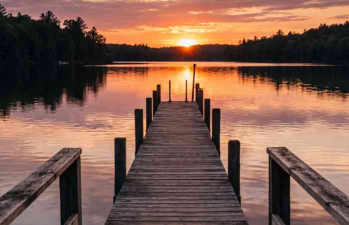 Boating dock on a lake at sunset