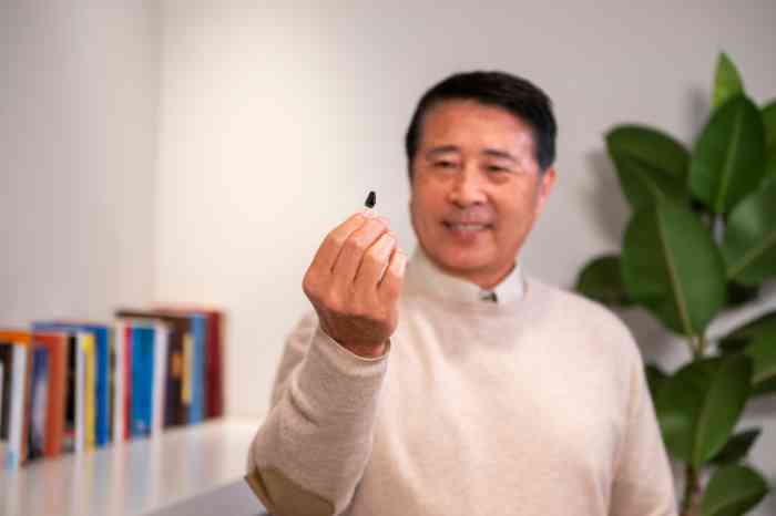 man trying on hearing aids