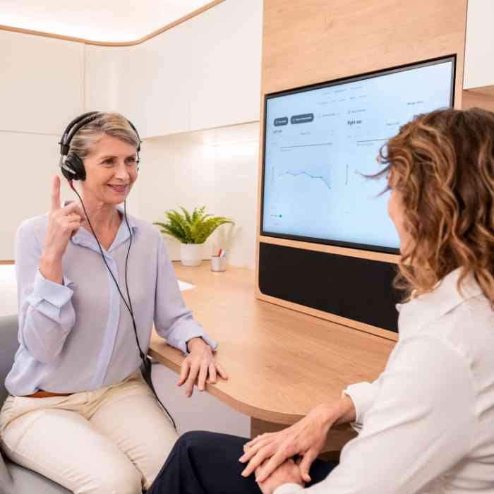 Woman having her hearing tested