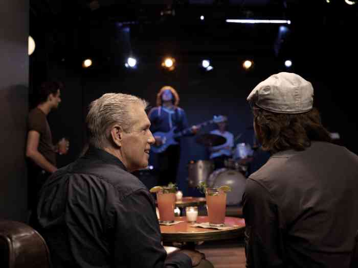 two men at a concert