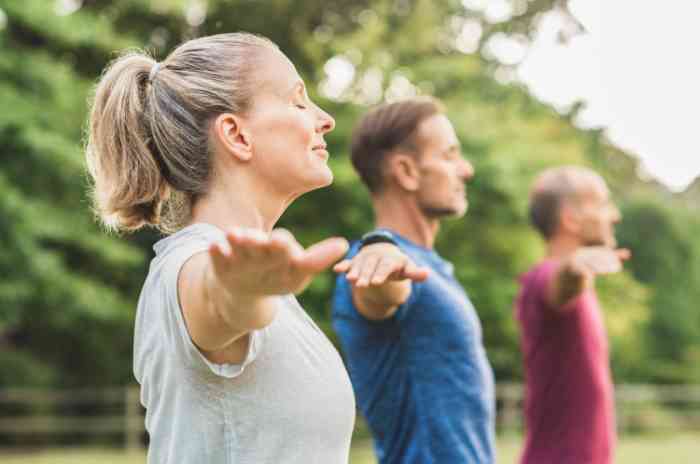Group of friends working out outside