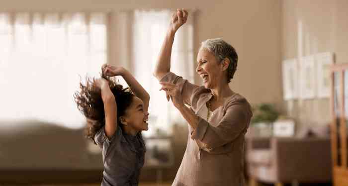 Woman dancing with a young girl