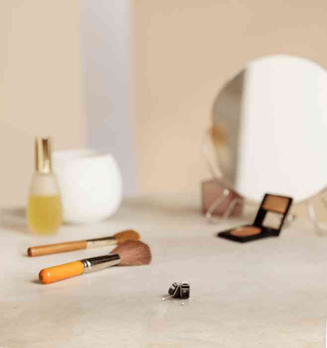 Mini hearing aids on a nightstand
