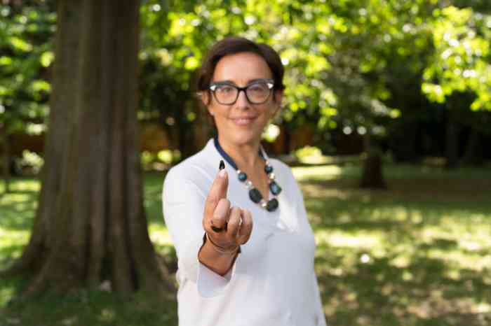 Bliss Hearing aid and two people walking together